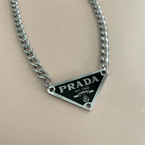 prada charms for men.